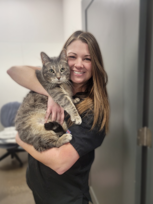 Dr. Britton holding a cat